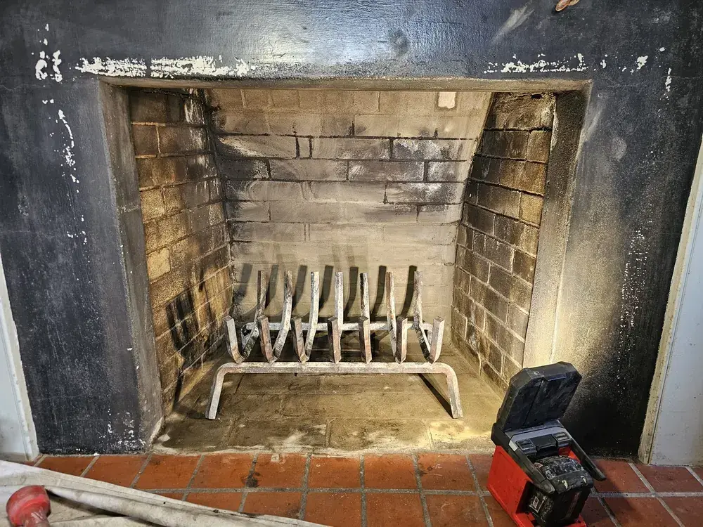 Clean fireplace after a chimney sweep