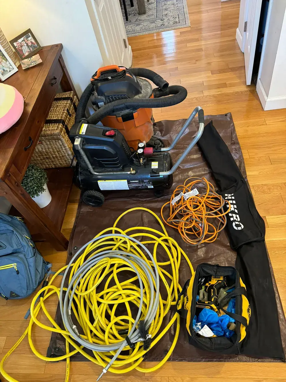 Nikro negative-pressure duct cleaning machine connected to a home HVAC system