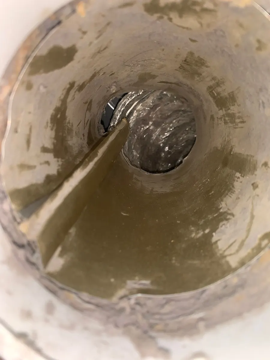 Real duct cleaning job photo — buildup inside a residential duct system