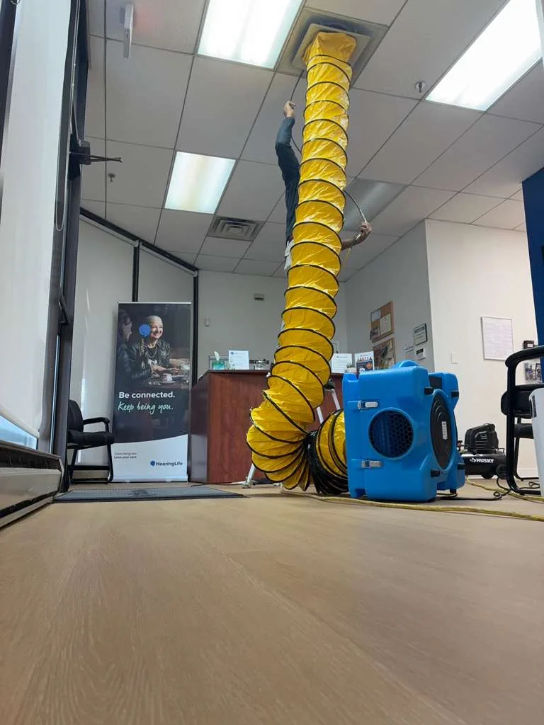 Duct cleaning technician serving Devon, PA with negative-pressure equipment